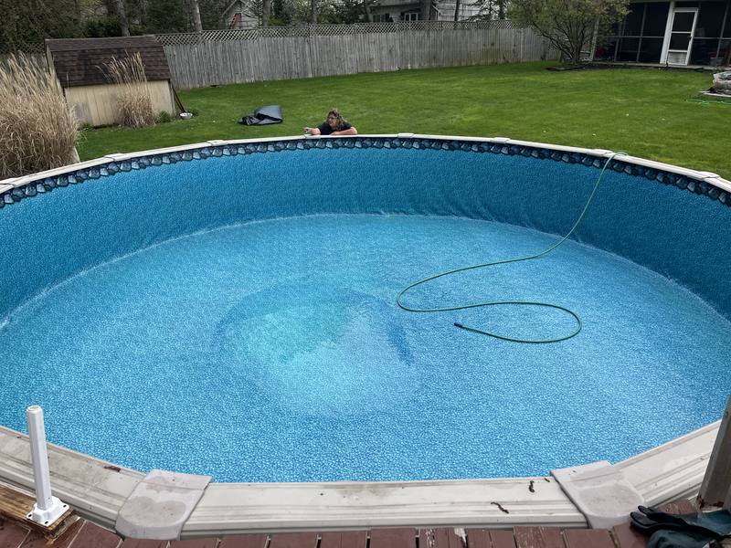 After liner replacement in the Rochester, NY area: clear water over a new liner